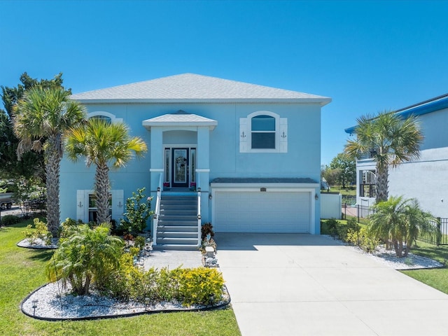 view of front of property with a garage