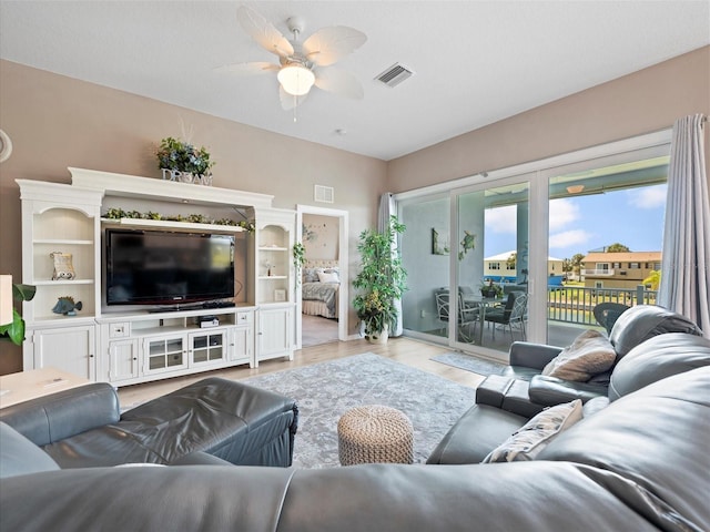 living room with ceiling fan