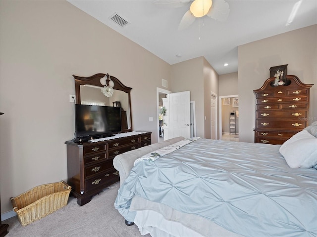 bedroom featuring light colored carpet and ceiling fan