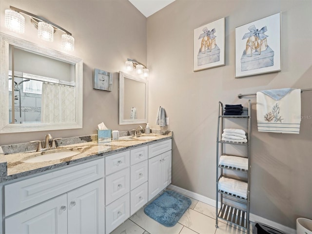 bathroom with double sink, oversized vanity, and tile flooring