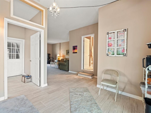 sitting room featuring an inviting chandelier