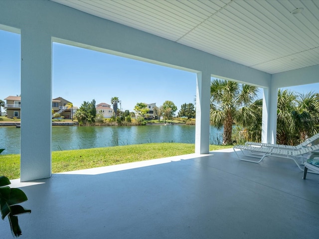 view of patio featuring a water view