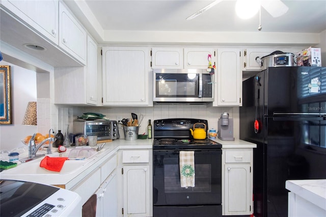 kitchen with white cabinets, black appliances, sink, tasteful backsplash, and ceiling fan