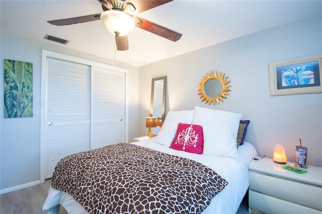 bedroom featuring a closet and ceiling fan