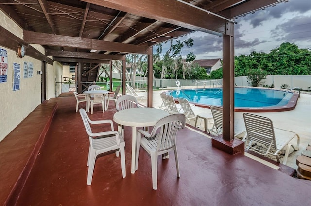 view of patio / terrace featuring a community pool