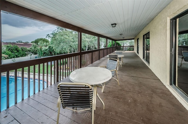 exterior space with a fenced in pool