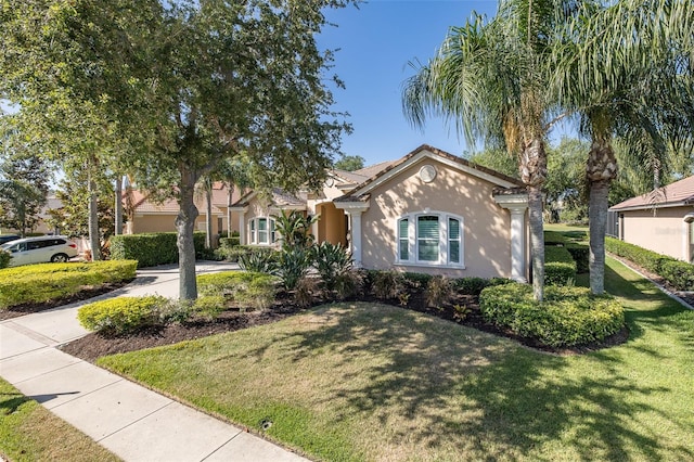 view of front of home with a front yard