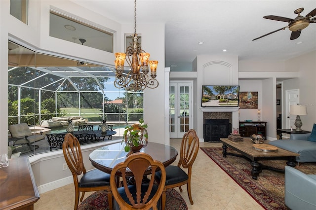 dining space featuring ceiling fan and light tile patterned flooring