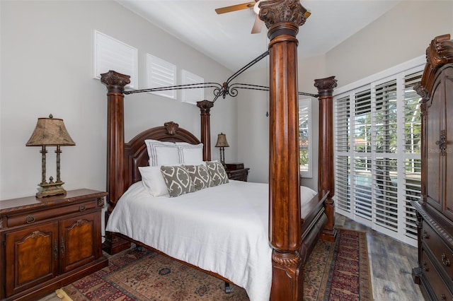 bedroom featuring dark hardwood / wood-style floors and ceiling fan