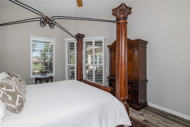 bedroom featuring ceiling fan and dark hardwood / wood-style flooring