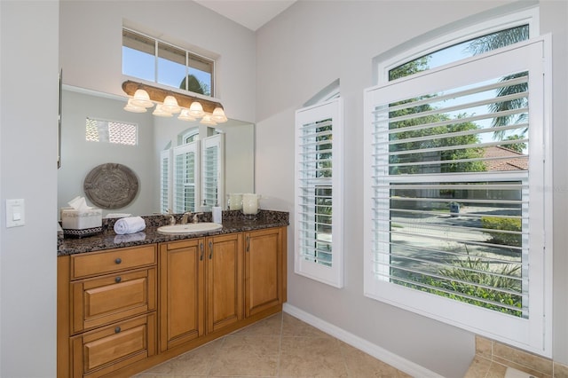 bathroom featuring tile patterned floors and vanity