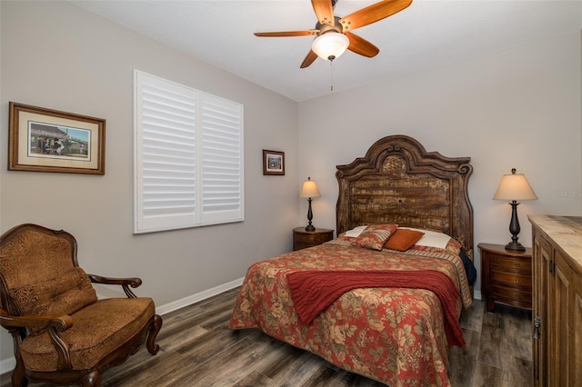 bedroom with ceiling fan and dark hardwood / wood-style flooring