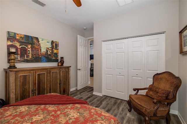 bedroom with ceiling fan, a closet, and dark hardwood / wood-style floors