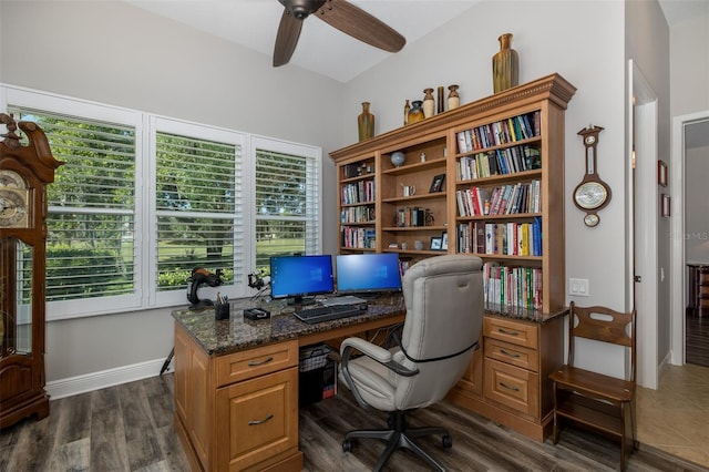 office space featuring dark hardwood / wood-style floors, vaulted ceiling, and ceiling fan