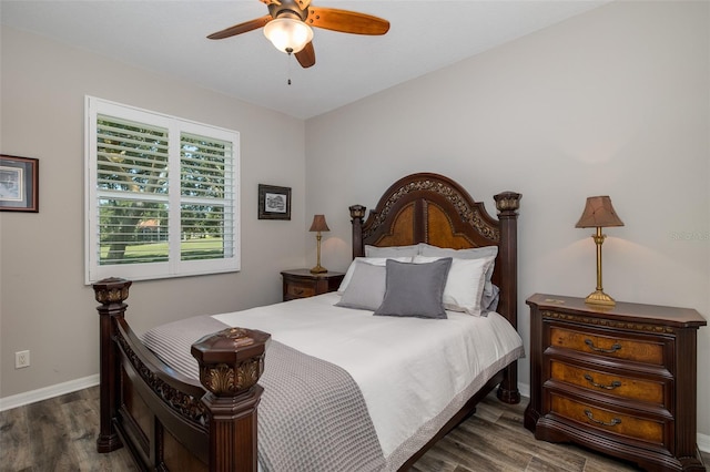 bedroom featuring ceiling fan and dark wood-type flooring