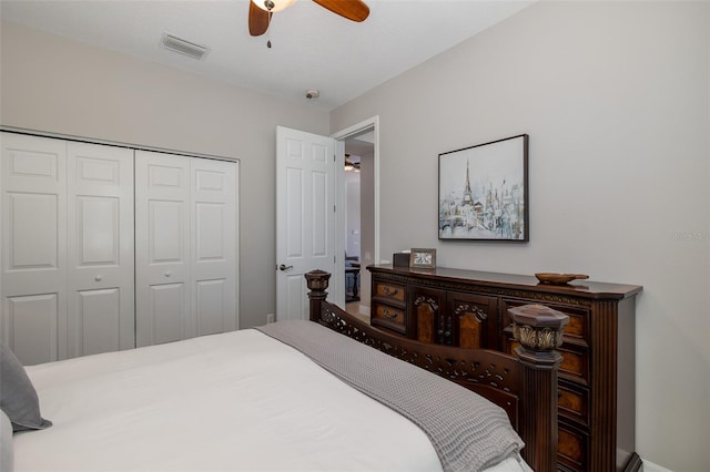 bedroom with ceiling fan and a closet