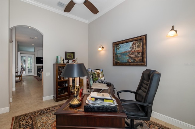 tiled office space featuring french doors, ceiling fan, and crown molding