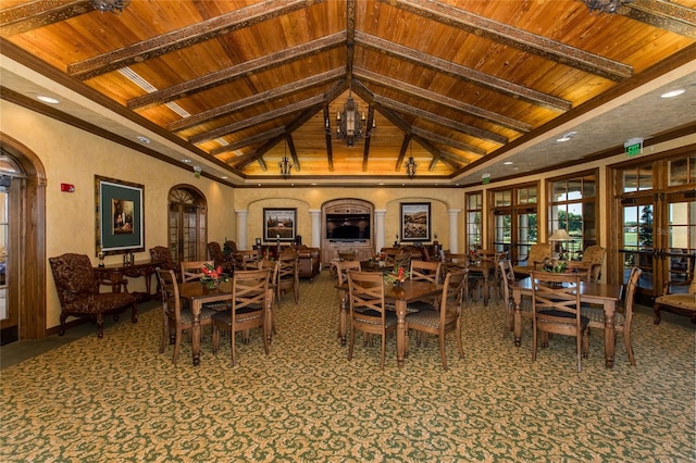 carpeted dining area featuring french doors, high vaulted ceiling, wooden ceiling, and beam ceiling