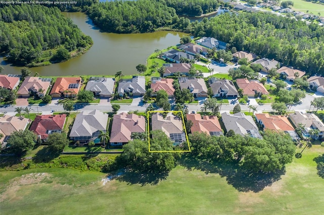 birds eye view of property featuring a water view