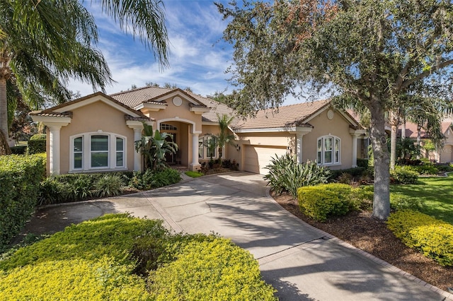 view of front of home with a garage