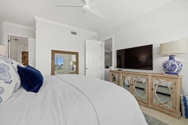 bedroom with carpet, ceiling fan, and crown molding