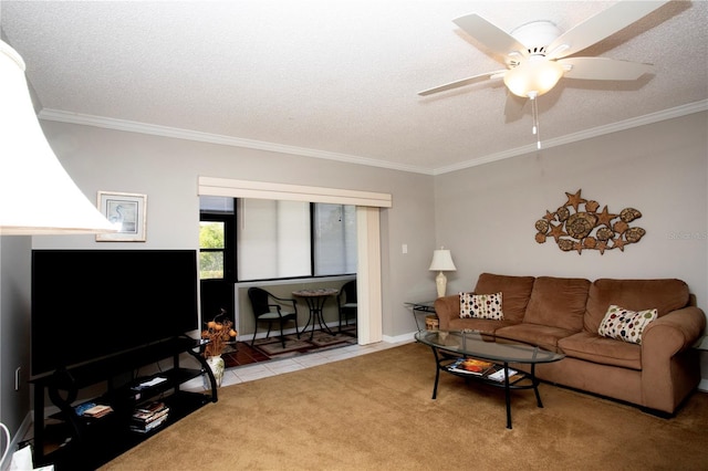 living room with ornamental molding, light colored carpet, ceiling fan, and a textured ceiling