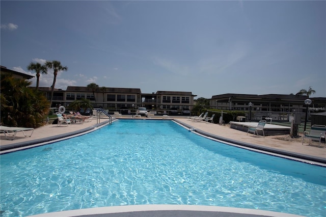 view of swimming pool featuring a patio