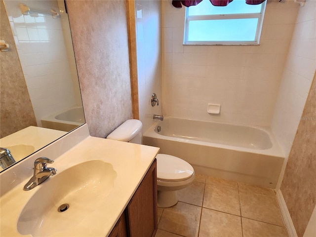 full bathroom with vanity, toilet, tiled shower / bath, and tile flooring