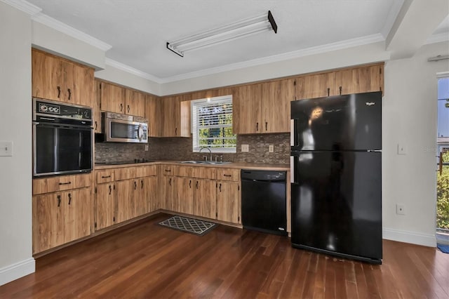 kitchen featuring tasteful backsplash, black appliances, dark hardwood / wood-style flooring, sink, and ornamental molding