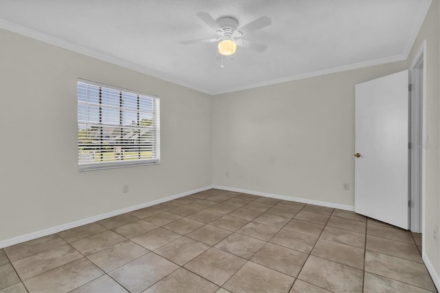 empty room featuring ceiling fan, crown molding, and light tile flooring