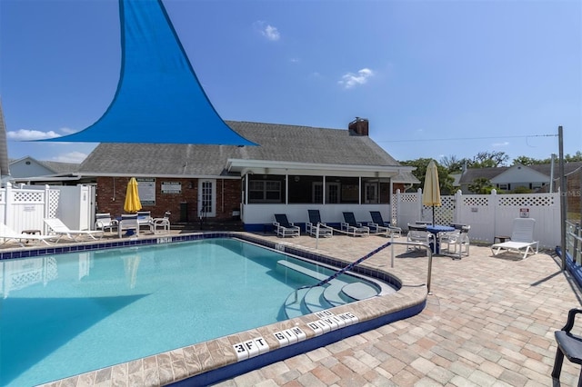 view of pool with a patio