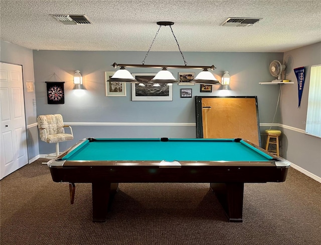 recreation room with billiards, a textured ceiling, and carpet