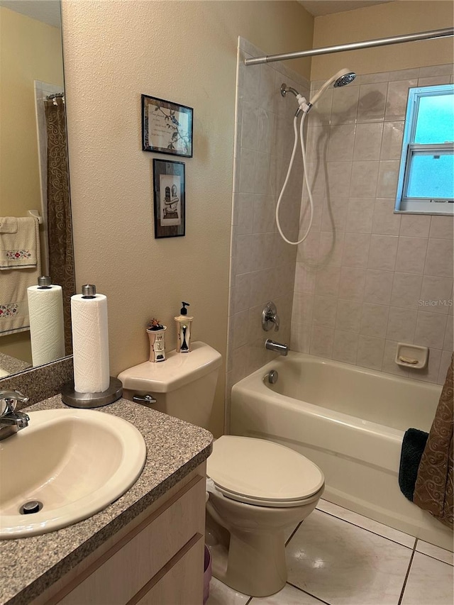 full bathroom featuring tile patterned floors, vanity, toilet, and shower / tub combo with curtain