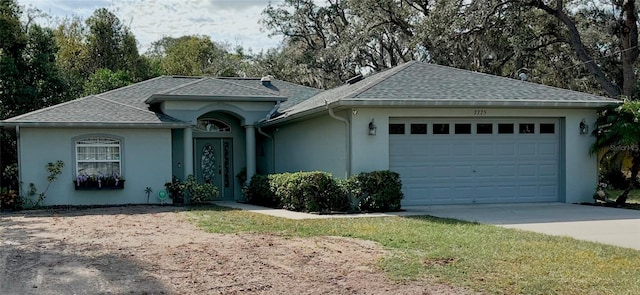 single story home with a garage