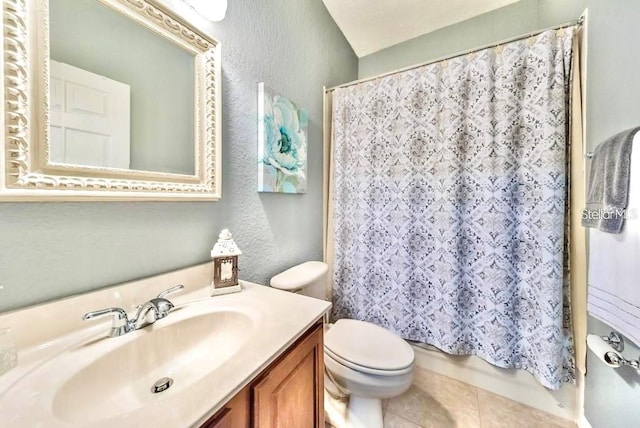 full bathroom with tile floors, vanity, toilet, and shower / bathtub combination with curtain