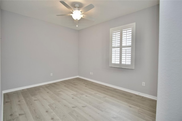 unfurnished room with ceiling fan and light hardwood / wood-style floors