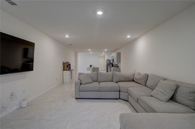 living room with light tile floors