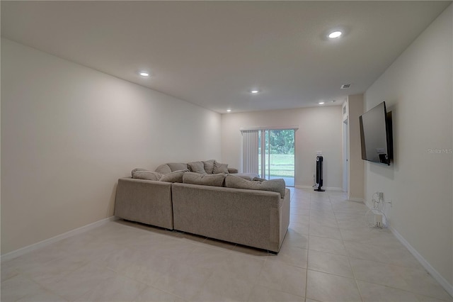 living room with light tile flooring