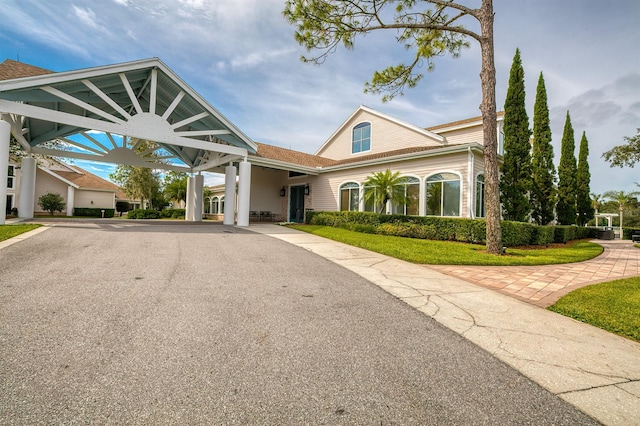 view of front facade with a carport