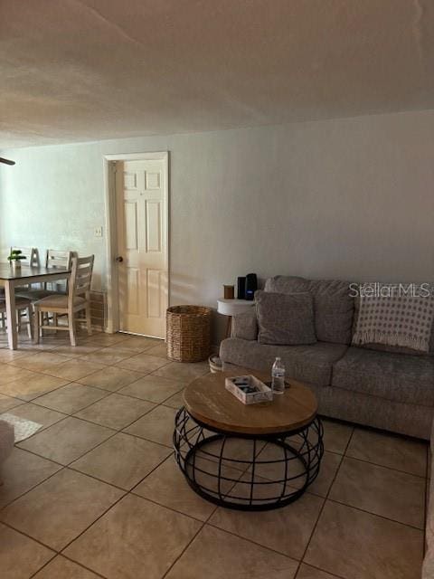 living room with tile floors