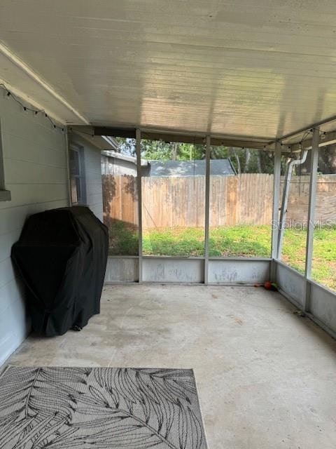 sunroom / solarium featuring a healthy amount of sunlight