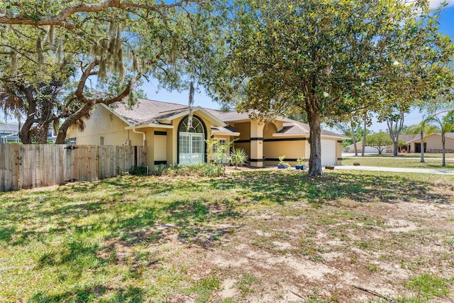 single story home with a front yard