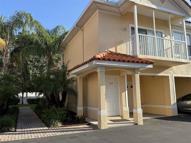 exterior space featuring a balcony