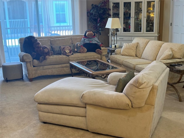 living room featuring light colored carpet