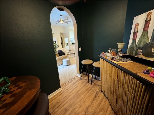 corridor featuring hardwood / wood-style floors