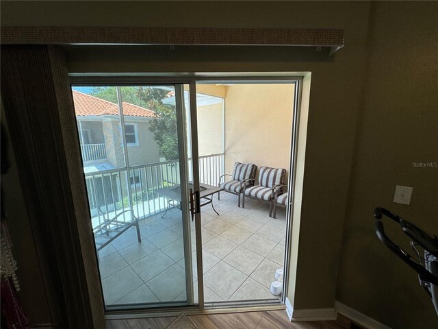 doorway to outside featuring hardwood / wood-style floors