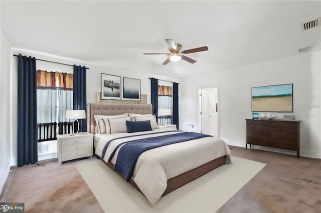 bedroom featuring ceiling fan and multiple windows