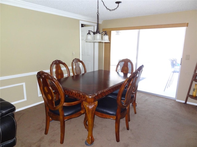 carpeted dining room with a textured ceiling and a chandelier