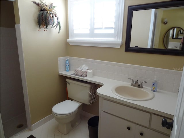 bathroom featuring walk in shower, tile patterned flooring, toilet, decorative backsplash, and vanity