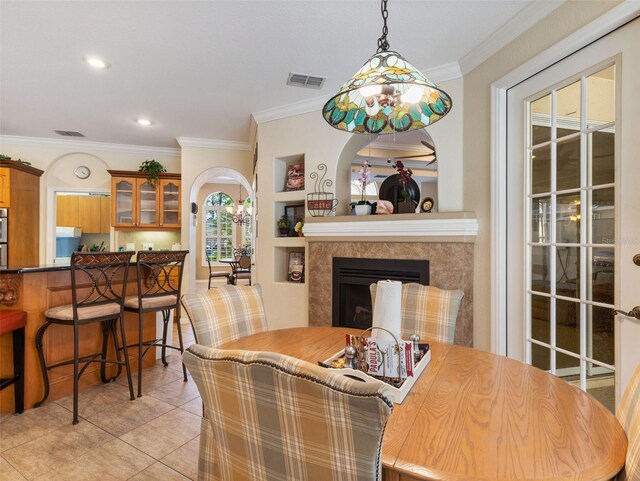 tiled dining space with ornamental molding